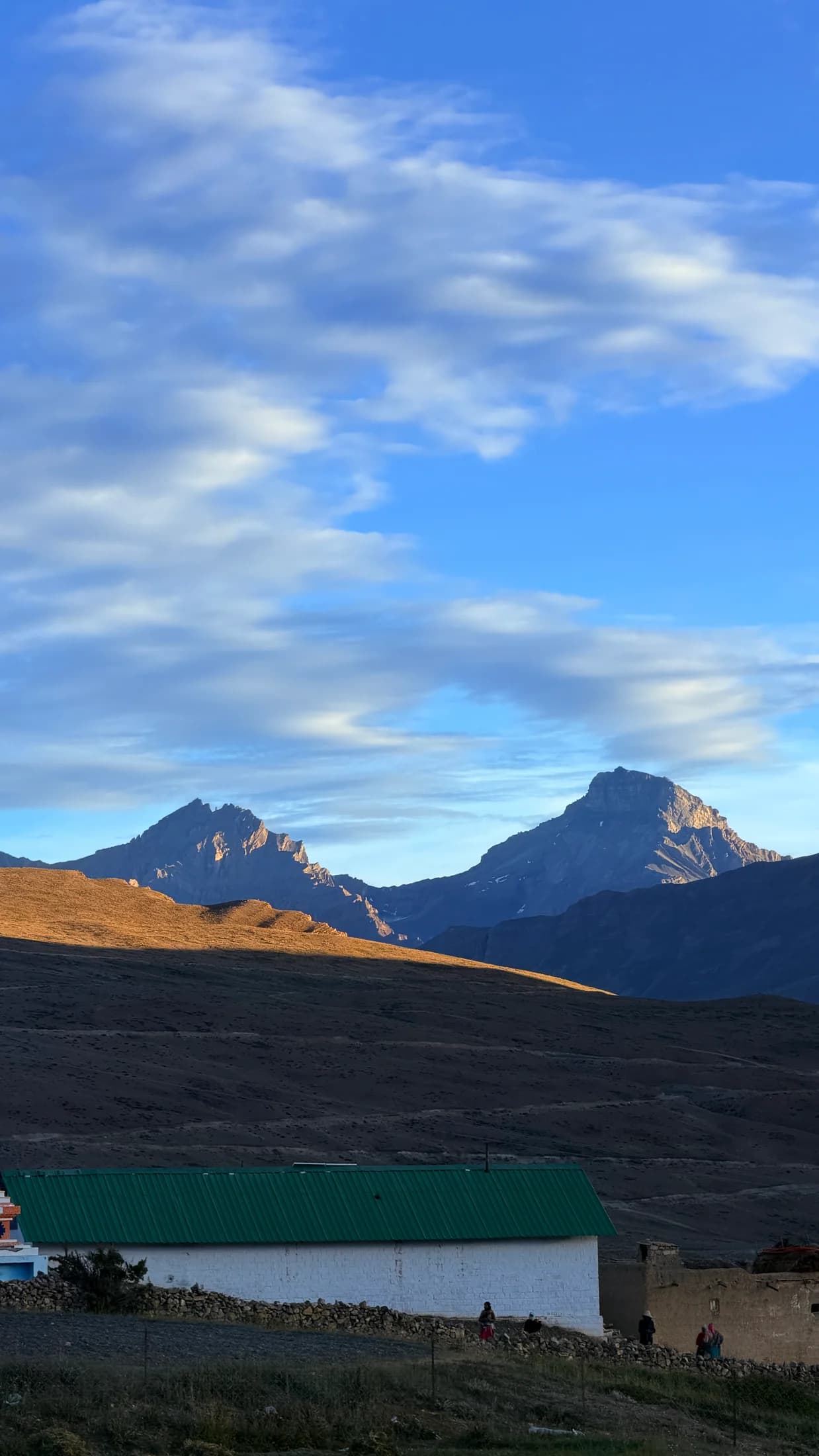 Evening light on mountains above the village
